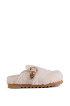 Like clouds for your feet. The AZALEA WANG Devany White Sherpa Slip On Clog features a plush faux sherpa upper, flat textured sole, cushioned insole, and an easy slip-on fit. These cozy cuties are complete with a decorative faux leather buckle featuring metallic gold hardware. Wear them with leggings and an oversized turtleneck for a snug finish.  - Faux Sherpa Upper - Round Toe - Textured Flat Sole - Imported Product ID: 429438 Azalea Wang, Oversized Turtleneck, Leather Buckle, Metallic Gold, Gold Hardware, Clogs, Gold Metal, Faux Leather, Slip On