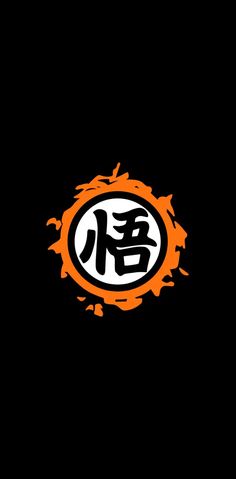 an orange and black chinese symbol on a black background