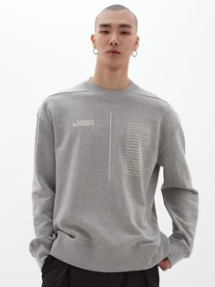 Editor's NotesDGNAK12’s sweatshirt gives casual look with oversized fit and lettering print detail.- Round neck sweatshirt- Long sleeves with drop shoulder- Ribbed cuffs and hem- Oversized fit- Lettering print in front- Minimized warpingMeasurements(in.)S / M / L- Length: 27.6in. / 28.3in. / 29.1in.- Shoulder: 22.0in. / 22.6in. / 23.2in.- Chest: 46.5in. / 48.0in. / 49.6in.- Hem: 42.9in. / 44.5in. / 46.1in.- Sleeve: 23.6in. / 24.2in. / 24.8in.*Model Info: 6’2’’ Waist 27’’ Shoes KR270mm(US9) Fitti Relaxed Fit French Terry Sweatshirt With Ribbed Cuffs, Oversized French Terry Crew Neck Sweats, Spring Sweater With Text Print And Relaxed Fit, Spring Relaxed Fit Sweater With Text Print, Long Sleeve Logo Print Sweatshirt For Loungewear, Spring Sweatshirt With Graphic Print And Drop Shoulder, Graphic Print French Terry Sweatshirt For Loungewear, Oversized French Terry Top With Text Print, Drop Shoulder Graphic Print Sweatshirt For Spring