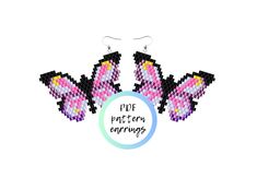 two pink and black butterfly earrings with the words ppe pattern envy on it's side