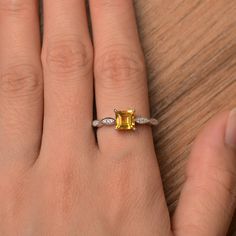 It is a natural citrine ring, square cut, measures 6mm*6mm, weight about 1.03 cts. The basic metal is sterling silver and plated with rhodium. To change the metal to a solid gold (white/rose) or platinum is also available, please ask for a quotation if you want. You can also go to my shop Home for more elegant rings: https://www.etsy.com/shop/godjewelry?ref=hdr_shop_menu More citrine rings: https://www.etsy.com/shop/godjewelry?ref=seller-platform-mcnav&search_query=citrine Customization is a Yellow Square Cut Ring For Anniversary, Yellow Rectangular Anniversary Ring, Rectangular Citrine Wedding Rings, Yellow Square Cut Rings For Gift, Citrine Cushion Cut Wedding Rings, Cushion Cut Citrine Wedding Rings, Elegant Yellow Sterling Silver Birthstone Ring, Citrine Cushion Cut Jewelry For Anniversary, Yellow Princess Cut Jewelry For Gifts