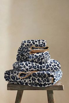 three leopard print towels stacked on top of each other