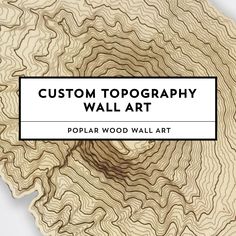 a wooden wall art piece with the words, custom topography wall art