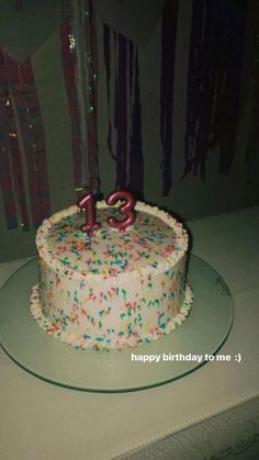 a birthday cake with sprinkles and the number twenty five on it