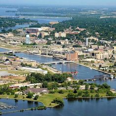 an aerial view of a city and river