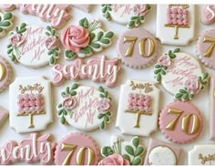 decorated birthday cookies with pink and gold frosting for seventyth birthday cake decorating