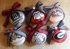 six ornaments with black and white designs on them