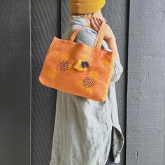 Handcrafted from beautiful linen materials, this mini tote bag boasts a unique combination of block printing and wool embroidery. The playful, abstract design is rendered in a bold color palette. Versatile enough for everyday errands or special occasions, it also makes a thoughtful gift.  This is mini size (W15.5 x L10.5), smaller than our standard size.  This bag is constructed from delicate linen, making it suitable for various occasions such as casual outings or gift presentation. However, du Orange Cotton Canvas Tote Bag, Hand Printed Canvas Tote Bag - Ideal Gift, Hand Printed Canvas Tote Bag Ideal For Gifts, Hand Printed Canvas Tote Bag Perfect For Gifts, Hand Printed Canvas Tote Bag For Gift, Hand-printed Tote Bag For Daily Use, Hand Printed Tote Bag For Daily Use, Hand Printed Canvas Tote Bag For Daily Use, Hand Printed Canvas Tote Bag