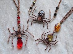 spooky season spider chokers/necklaces crafted with antiqued copper wire, glass and gemstone beads✨ choose your favourite and your desired chain length 🖤 red- glass (no gemstone, pendant style)  golden- citrine & glass (pendant style)  black- snowflake obsidian & glass (choker style) Wire Wrapped Spider, Spider Wire Wrap, Wire Spider Necklace, Crystal Suncatchers Spider, Copper Lace, Blue Lace Agate Earrings, Shark Tooth Pendant, Spider Necklace, Black Lace Choker