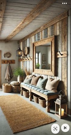 a wooden bench sitting next to a mirror on top of a wall in a living room