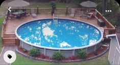 an above ground swimming pool surrounded by lawn furniture