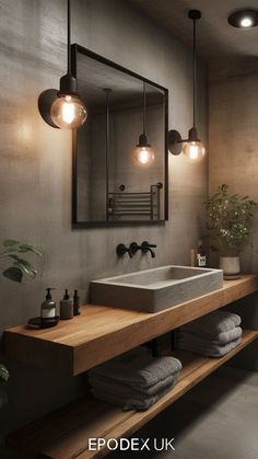 a bathroom with a sink, mirror and lights