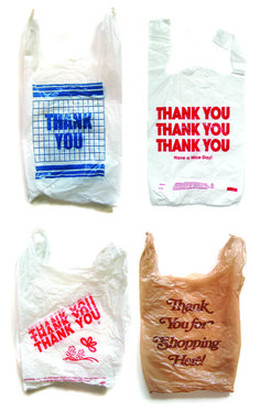 four bags with thank you and thank you written on them, all wrapped in plastic