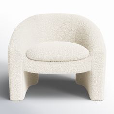 a white chair with a round cushion on it's back end and legs, sitting in front of a gray background