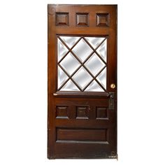 a wooden door with a glass window on it