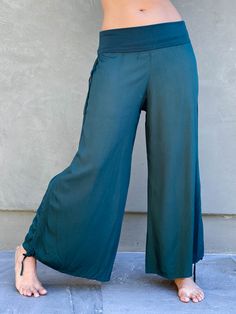 women's natural rayon lightweight loose fit adjustable teal blue side ruched pants with stretchy wide waistband #color_teal Versatile Stretch Viscose Pants, Versatile Stretch Wide Leg Parachute Pants, Stretch Rayon Wide Leg Full Length Pants, Stretch Rayon Full-length Wide Leg Pants, Viscose Stretch Wide Leg Bottoms, Stretch Viscose Wide Leg Bottoms, Stretch Rayon Wide Leg Bottoms, Stretch Wide Leg Viscose Bottoms, Bohemian Ruched Bottoms For Spring