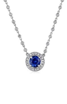 A diamond bezel chain trickles down to a brilliant sapphire pendant haloed in pavé diamonds and cast in 18-karat gold. 18" length Total sapphire weight: 2.12ct. Total diamond weight: 2.12ct. Color: G–H Clarity: VS 18k gold/diamond/sapphire Made in the USA >Diamond Guide Luxury Round Sapphire Diamond Necklace, Sapphire Round Diamond Necklace In Fine Jewelry Style, Sapphire Diamond Necklace In Round Shape, Sapphire Diamond Necklace Fine Jewelry, Dazzling Sapphire Jewelry With Pave Setting, Fine Sapphire Jewelry With Pave Setting, Classic Sapphire Jewelry With Pave Setting, Sapphire Necklace With Brilliant Cut, Formal Sapphire Necklace With Single Cut Diamonds