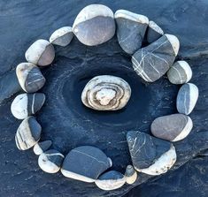 a circle made out of rocks in the water