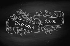 chalkboard welcome sign with ribbon and leaves