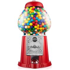 a red gummy machine filled with lots of colorful candies on top of it