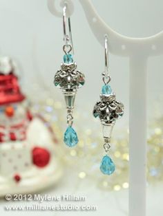 Frozen-inspired Christmas dangle earrings. These are quick and easy to make. What I love about them is that they combine inexpensive acrylic snowflake beads with sparkly Swarovski… and it works! #frozenearrings #christmasearrings #dangleearrings #MillLaneStudio #disneyearrings #diyearrings #jewelrymaking Christmas Jewelry Diy, Free Jewellery Making Tutorials, Disney Earrings, Twelve Days Of Christmas, Earring Tutorial, Woven Bracelets, Holiday Jewelry, Jewelry Making Tutorials, Christmas Earrings