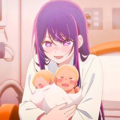 a woman with purple hair holding a baby in her arms and looking at the camera