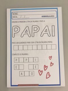 a paper with the words papai written in spanish on it and hearts drawn on it