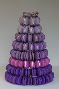 a stack of purple macaroons sitting on top of each other