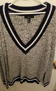 This Black, White And Gray Sweater Has A Deep V-Neck Which Pairs Nicely With A Black Or White Camisole. Size Small, But Runs A Bit Large. New Without Tags. Never Worn. Gray V-neck Tops With Letter Print, Forever 21 V-neck Tops For Winter, Chic V-neck Tops By Forever 21, Black V-neck Knit Sweater Dress, Black V-neck Acrylic Sweater, White Camisole, Forever 21 Black V-neck Dress, Forever 21 Sweater, Gray Sweater