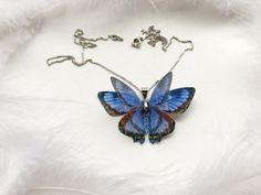 "🌸 Realistic design, Butterfly looks like a real one 🌸 Butterfly Wingspan (Width) is about 5.1 cm / 2\" 🌸 The price is only for the pendant (chain is included as a gift, - the chain is Rhodium plated of high quality, length 17.7\" / 45 cm) 🌸 Wings are made of silk with a beautiful 3D effect 🌸 Great gift for those who love Moths and Butterflies! Ready to ship! Feel free to write me if you have any questions! 😊" Multicolor Butterfly Jewelry Gift, Multicolor Butterfly Jewelry For Gifts, Blue Butterfly Jewelry With Butterfly Print, Blue Butterfly Print Jewelry As A Gift, Blue Butterfly Print Jewelry For Gifts, Blue Jewelry With Butterfly Print For Gift, Multicolor Butterfly Print Jewelry Gift, Butterfly Print Butterfly Necklace For Gift, Blue Butterfly Necklace For Gifts