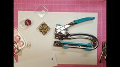 scissors and other crafting supplies laid out on top of a piece of white paper