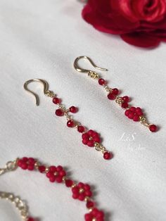 Handcrafted with love, these delicate floral earrings feature sparkling spinel gemstones set in a charming daisy design. Perfect for adding a touch of nature-inspired beauty to any outfit. 🌸✨ Spinel Gemstones Handmade Earrings DETAILS:  🌸 Genuine Spinel, Faceted rounded , Pure red (slightly darker) 🌸 High quality Japanese beads 🌸 14k gold-filled ear wires, Diameter 0.7mm, Hypoallergenic  🌸 Size:   Width 0.6cm  Length 4cm   -- -- --  Free Shipping on orders over HKD 300 (about $39/€37). No C Flower Bead Earrings, Red Beaded Earrings, Beaded Flower Earrings, Red Bead Earrings, Crochet Beaded Bracelets, Handmade Birthday Gifts, Spinel Gemstone, Handmade Earrings Beaded, Earrings Inspiration