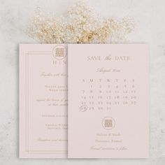 a pink wedding save the date card with dried flowers