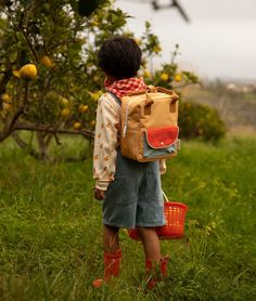 The perfect mini-backpack in a delightful color palette of golden yellow and poppy red, with a sky blue checked pocket on the front! Sticky Lemon is a Netherlands-based label founded in 2016 that designs products for kids and "kids at heart" of all ages. With their playful designs and environmentally-friendly ethos, they've become a forever favorite brand. The exterior is made from recycled PET bottles and the lining is waterproof nylon (in a fun black & white pattern, no less). On the inside yo Small Backpacks, Pear Jam, Kids Labels, Small Envelopes, Small Farmhouse, Lemon Patterns, Recycled Bottles, Dollhouse Accessories, Pet Bottle