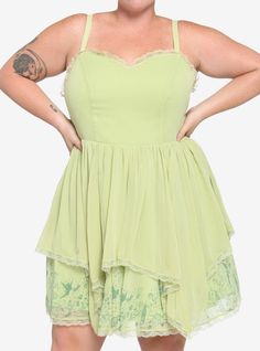 Add some faith trust and pixie dust to your wardrobe! From Disney's Peter Pan  this fun and flirty Tinker Bell dress is just for you! Light green gown features a layered skirt with lace detailing and character silhouette hem sweetheart neckline lace-up back and embroidered fairy wings. Bell Gown, Light Green Gown, Tinker Bell Dress, Embroidered Fairy, Character Silhouette, Faith Trust And Pixie Dust, Bell Dress, Peter Pan Dress, Gifts 2021