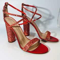 Giuseppe Zanotti Glitter Leather Sandal Womens Size 8.5 Nwt. 100% Authentic Made In Italy Color/Material: Geranium Leather (Between Pink & Red) Design Details: Sequin Glitter Details, Criss Cross Strap Buckle Closure Lightly Padded Leather Insole Smooth Leather Sole 4.5” Heel Dust Bag Msrp: $750 Glamorous Heel Strap Sandals For Party Season, Glitter Accents Sandals For Prom, Glitter Accented Sandals For Prom, Red Embellished Heels For Summer, Summer Embellished Red Heels, Chic Glitter Cocktail Heels, Block Heel Embellished Sandals For Party Season, Block Heel Heels With Glitter Accents For Party Season, Sparkling Block Heel Heels For Gala