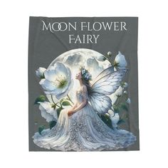 a white flower fairy sitting in front of a full moon with the words moon flower fairy on it