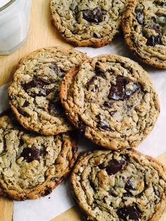 chocolate chip cookies and milk on a table