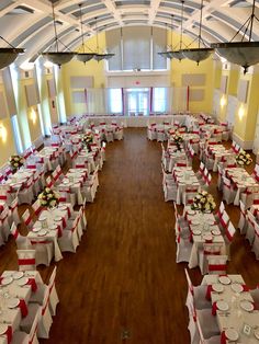 an empty banquet hall with tables and chairs