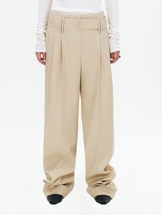 Editor's NotesThese oversized pants have straight silhouette in maxi length. They are accentuated with wide strap belt with nickel buckle detail for stylish feel. - Soft wool blend fabric- Intended for a loose fit- Classic hook and eye closure- Buckle strap detail at hip- Wide belt loops Measurements(in.)Size (S/M)- Length: 43.90 in / 44.29 in - Waist: 13.78 in / 14.57 in - Hip: 19.29 in / 20.08 in - Rise: 12.40 in / 12.80 in * Model info: Height 5' 8 Bust 29.5 Waist 23.5 Hip 35.5 / Height 5' 7 Bust 32 Waist 25 Hip 35, wearing Sample Size M that is longer in length. Composition & Care- 40% Wool, 60% Polyester / Lining: 100% Polyester - Dry Cleaning - Do not tumble dry / Do not bleach / Low iron Designer- by GABRIEL LEE Oversized Pants, Wide Trousers, Wide Belt, Soft Wool, Wide Straps, Wool Blend, Twins, Loose Fitting, Trousers