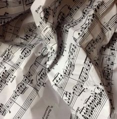 sheet music paper with musical notes on it