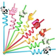 a bunch of colorful straws with farm animals on them