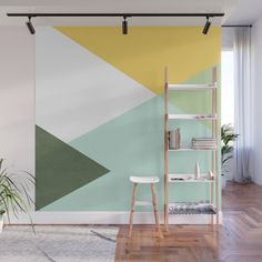 an abstract wall mural in a living room