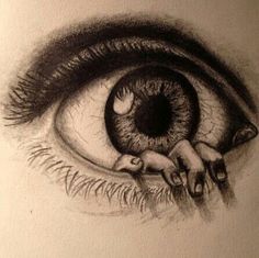 a pencil drawing of an eye with one hand on the outside of the iris's eye