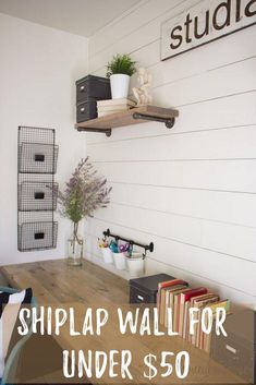 there is a desk with books on it and the words shiplap wall for under $ 50