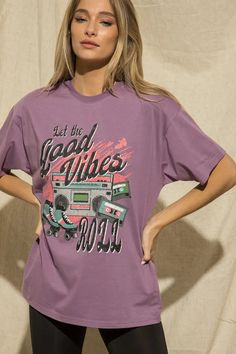 Make a statement with this Let The Good Vibes Roll Tee! Featuring a distressed detail and oversized fit, this purple t-shirt will have 'em rolling in good vibes. Don't be shy - time to get out there and show off your great style! 🤩 How To Style: Dressed Down: Wear it with your favorite shorts and sneakers for a fun on-the-go look! Dressed Up: Size up and wear it as a dress, paired with cowgirl boots and a jean jacket or blazer for a fun night-out look! How It Fits: Unisex relaxed fit. Recommend Purple Grunge T-shirt With Letter Print, Oversized Purple T-shirt With Letter Print, Trendy Purple Slogan T-shirt, Oversized Purple Top With Text Print, Retro Purple Tops With Graphic Print, Purple Retro Tops With Graphic Print, 90s Purple Top With Graphic Print, 90s Style Purple Top With Graphic Print, 90s Graphic Print Purple Top