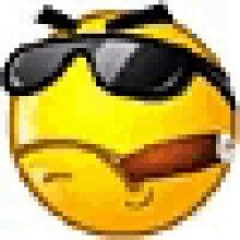 an emoticive smiley face wearing sunglasses