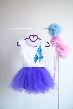 This Pinkie Pie Inspired Tutu dress is perfect for Birthday party, Halloween party and Dress up The dress is made with high quality fabrics. Top of the dress: 100% cotton fabric Bottom of the dress: High quality bridal nylon tulle fabric ( soft and not stiff) Lining: 100% cotton fabric There is a corset like closing at the back of the dress which lets to adjust the fit of the dress. There is an elastic band at the back of the waistband. The dress is easy to pull on and very adjustable. This dres Blue Party Dress For Halloween, Princess Costume In White For Costume Party, White Princess Costume For Costume Party, Fitted Princess Dress For Halloween Birthday, Princess Style White Costume For Party, Blue Sleeveless Princess Dress For Costume Party, Sleeveless Blue Princess Dress For Costume Party, White Princess Style Fancy Dress Costume, Fitted Princess Dress For Carnival Costume Party