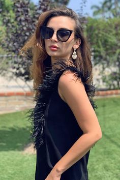 The season-less black top you can wear forever. Lovely Black crepe fabric with real sustainable sourced ostrich feathers. Keyhole back neckline. Women Fashion, Easter outfits ideas, Spring fashion, Spring style, Casual outfits, Style inspiration, Women's top, Women fashion top. #womenfashion #easterfashion #springfashion #springoutfits #styleideas #womentop #evafranco Feather Top, Easter Fashion, Feather Tops, Crepe Top, Ostrich Feather, Ostrich Feathers, Crepe Fabric, Ladies Tops Fashion, Black Top