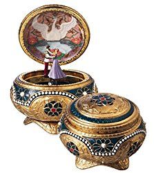 an elaborately decorated box with a couple in it